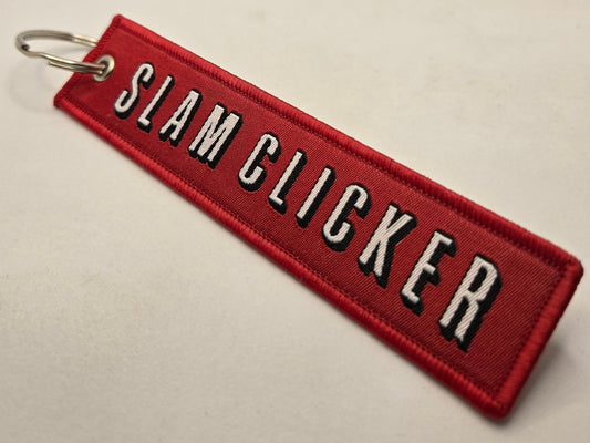 "SLAM CLICKER" bag tag